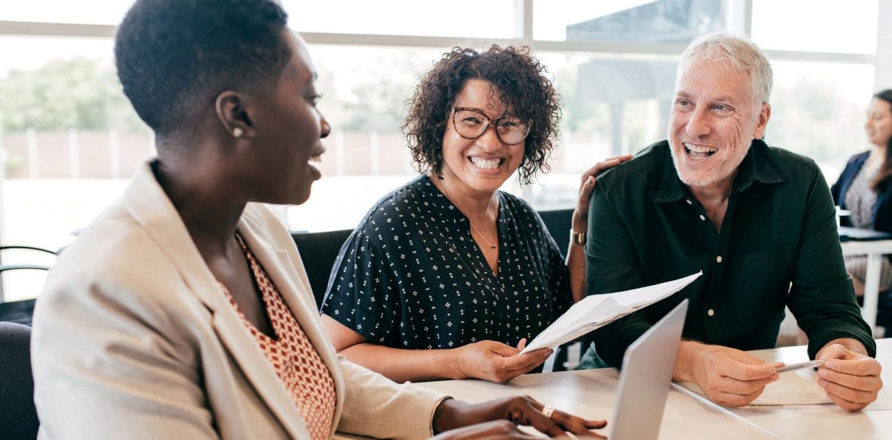 employees talking around table