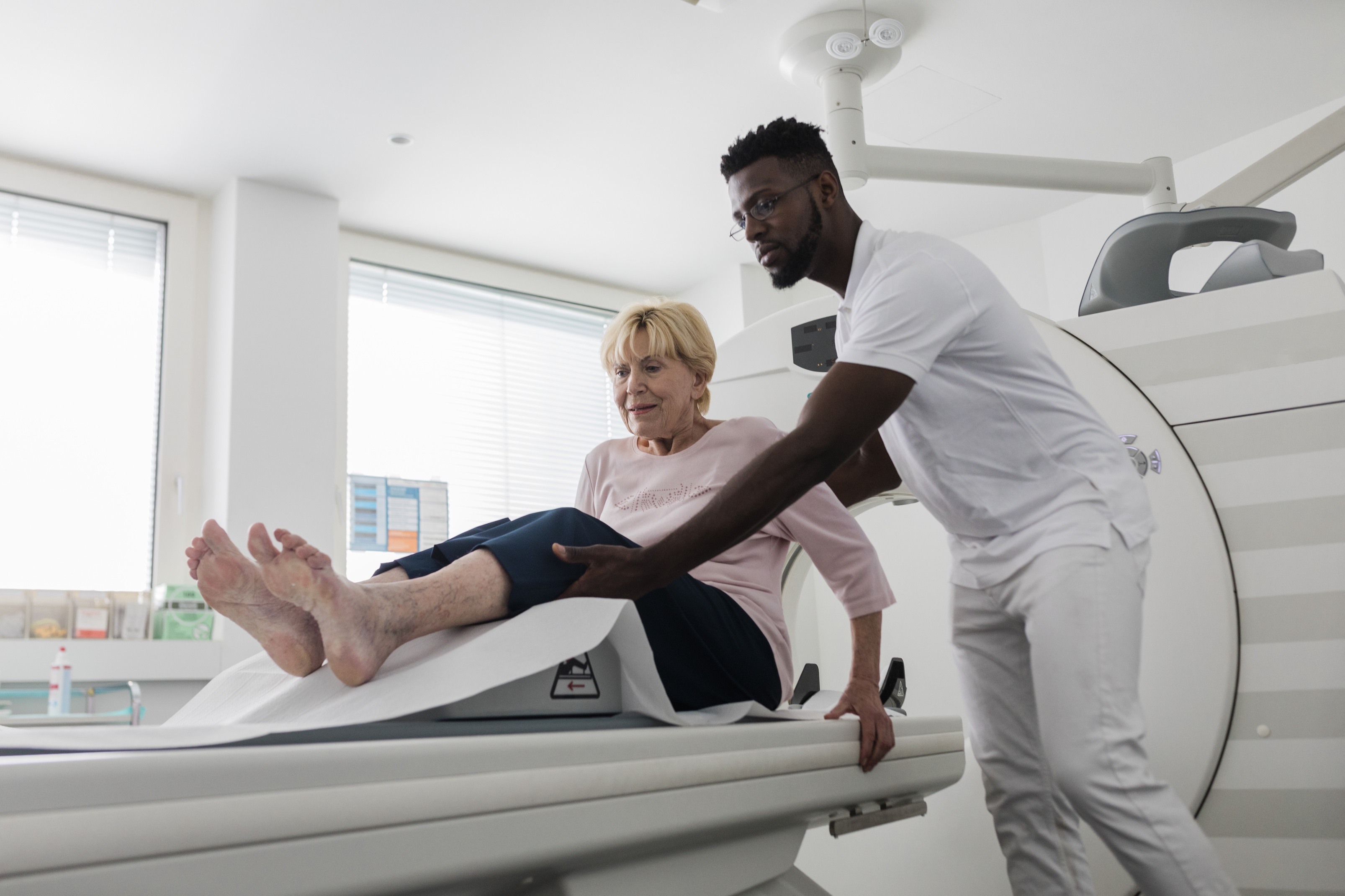 Doctor preparing patient for examination