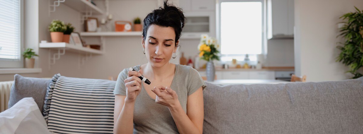 woman running some diabetes tests