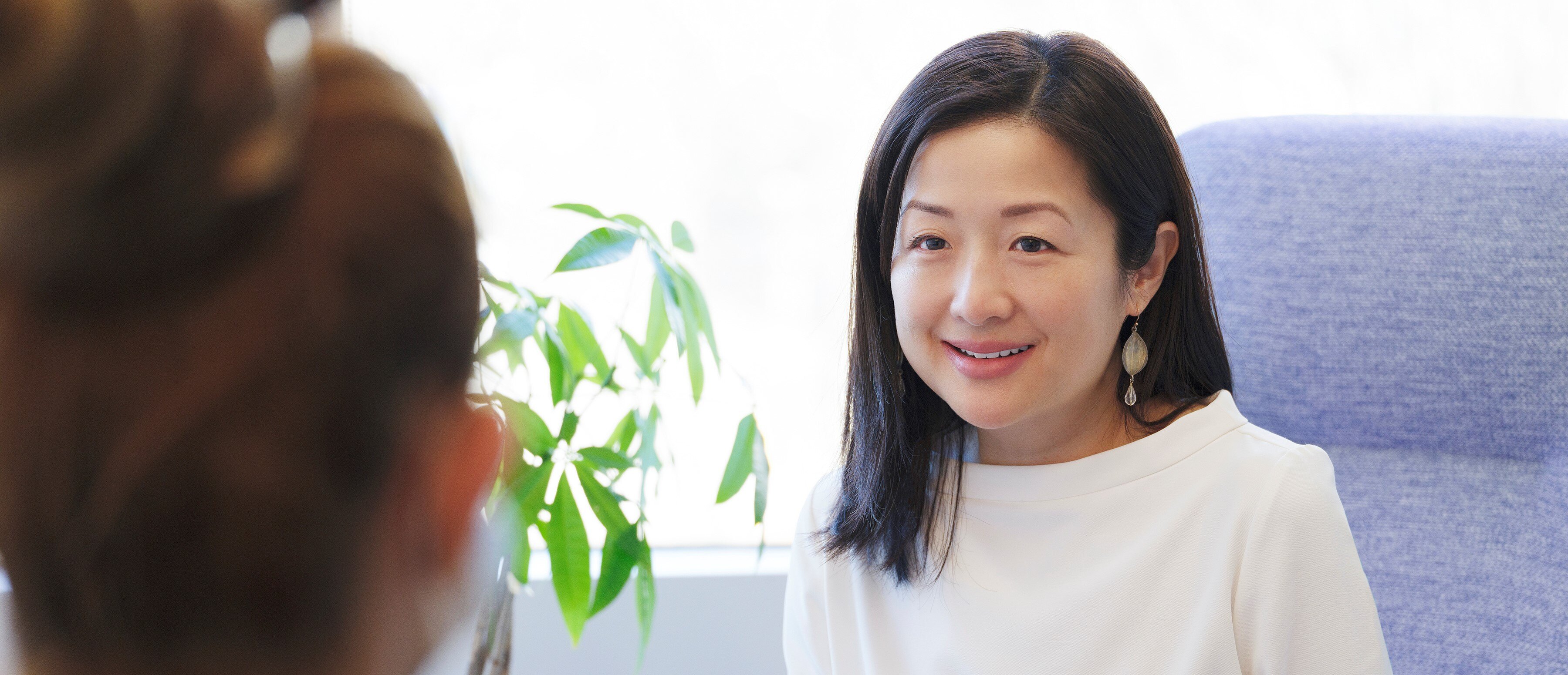 Dr. Lephuong Ong at the clinic having a consultation with a patient